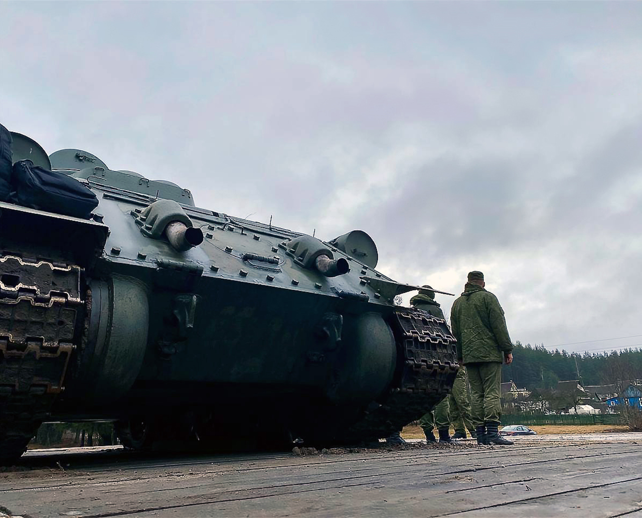 2 - Photographs of a troop train carrying T-34 tanks intended for a military parade being unloaded at Ozerishche station